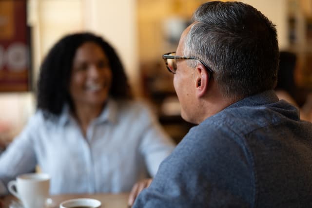 Man with hearing aids in