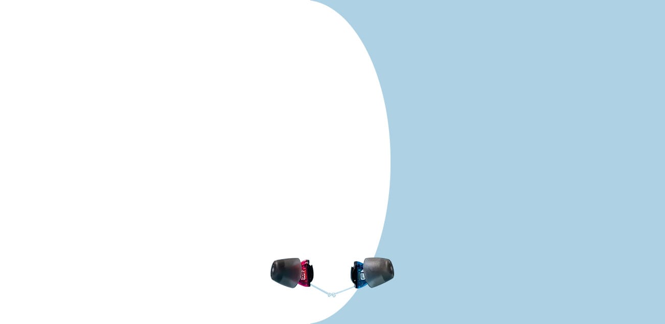 pair of audicus mini hearing aids blue background