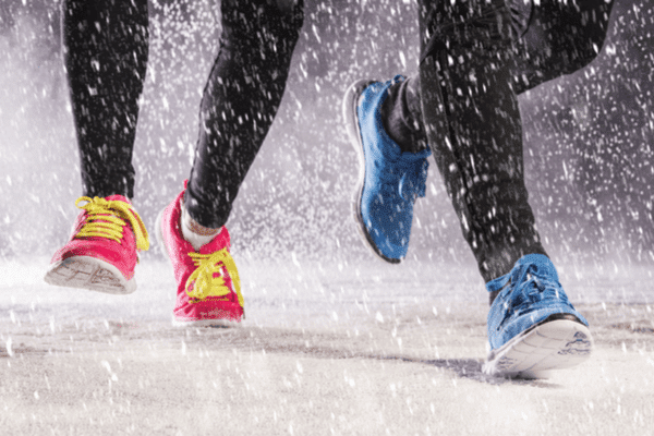 feet running in snow