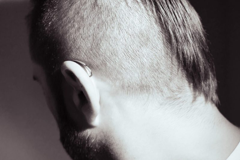 man wearing hearing aids for truhearing banner photo